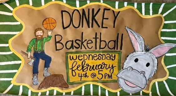 Playful hand-painted community event banner with lumberjack character spinning a basketball, illustrated donkey face, green and brown color palette, and decorative border with bold event details
